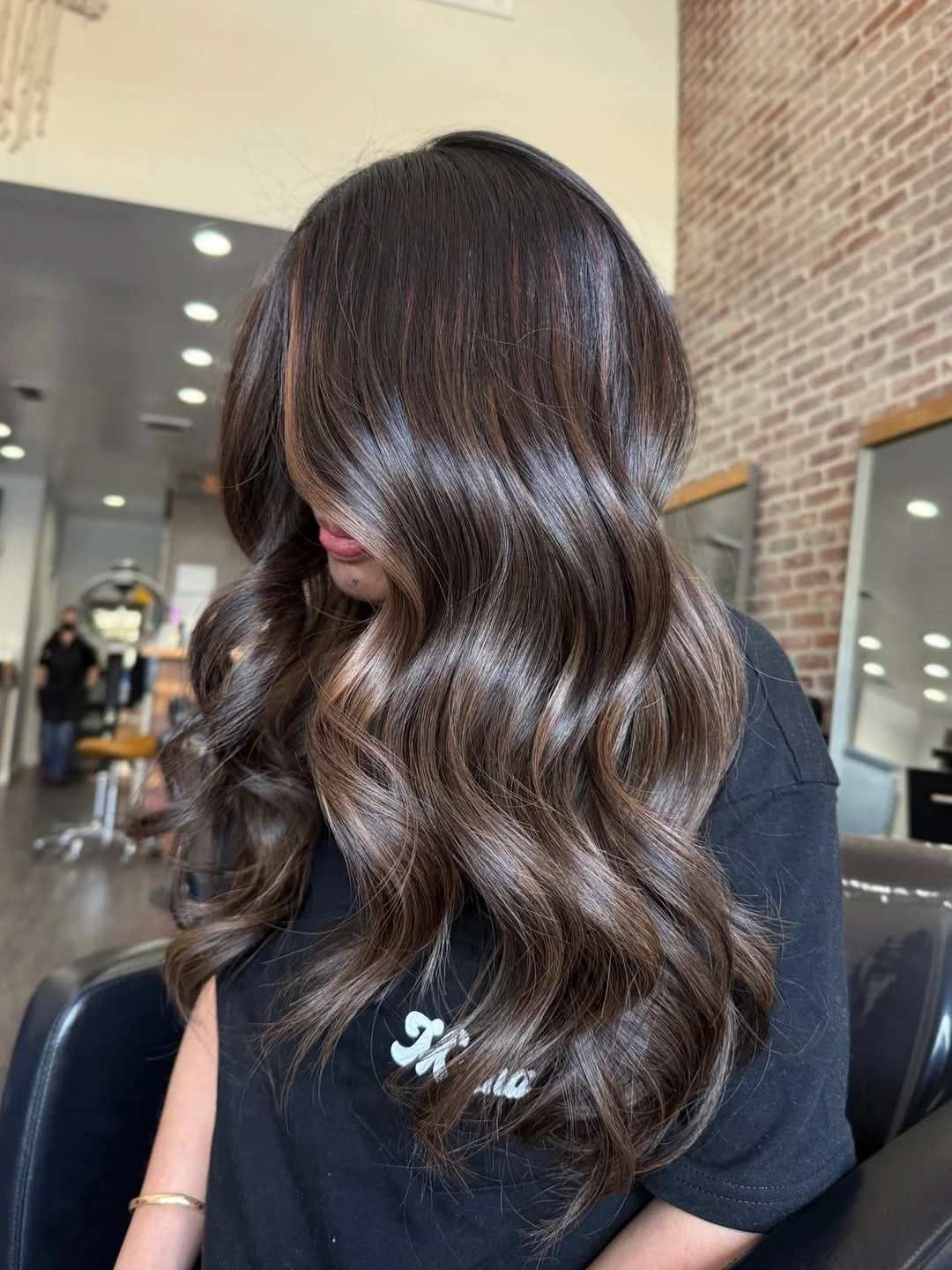 low maintenance summer hair color for brunettes Cool Mocha Waves With Soft Reflective Lights