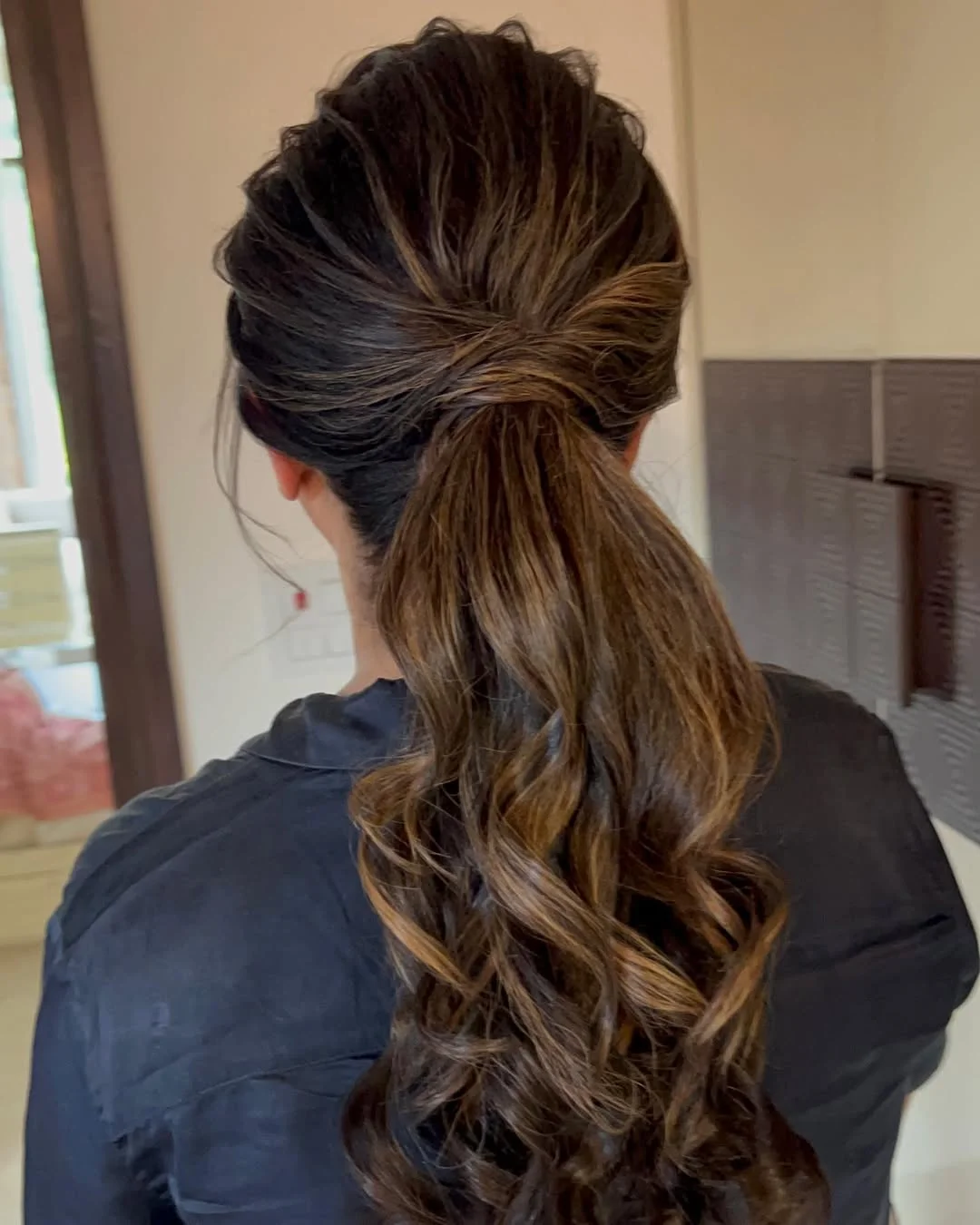 low summer ponytail hairstyle 2026 Soft Volume Low Ponytail with Brushed Curls