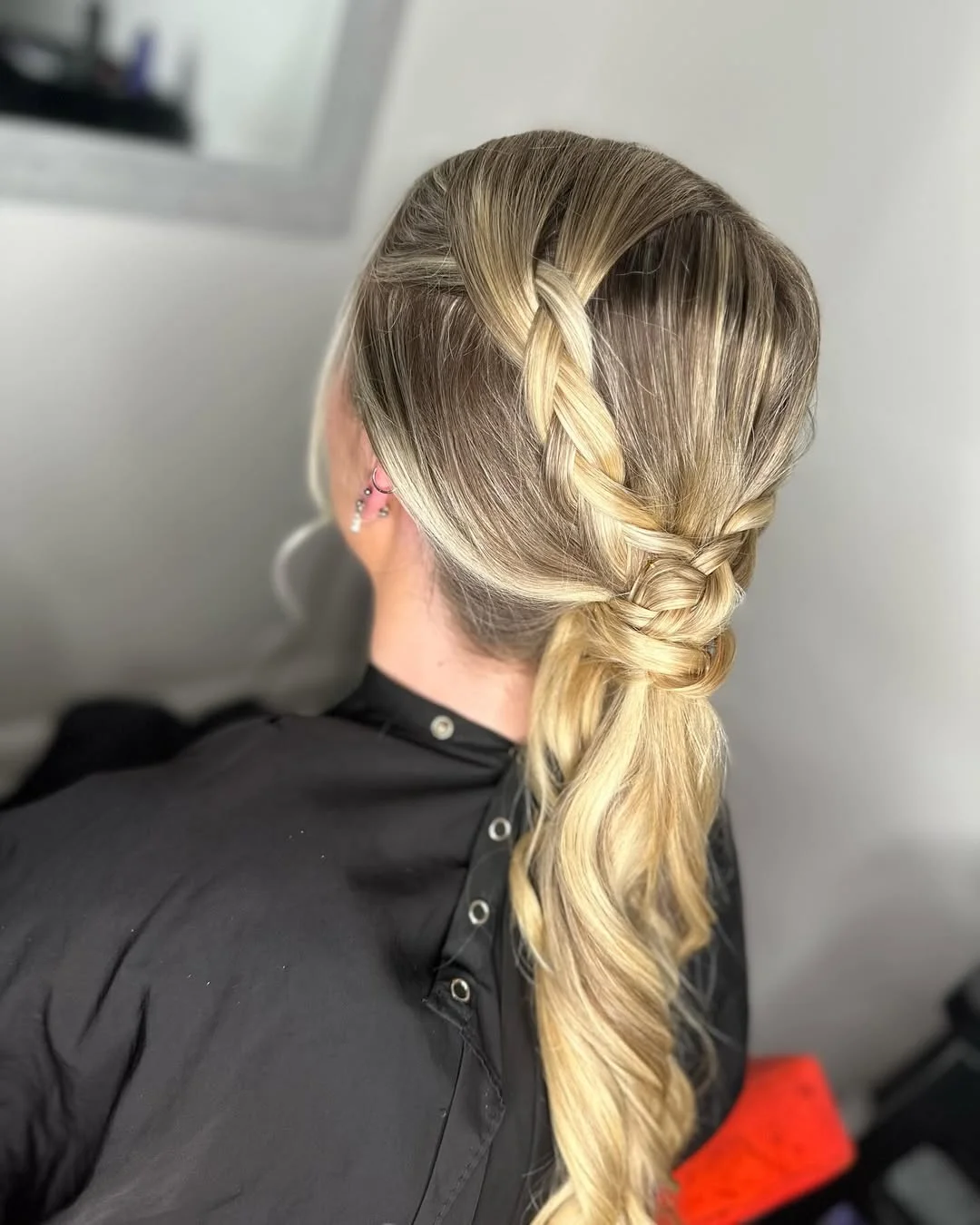 low summer ponytail hairstyle 2026 Braided Detail Low Ponytail with Bright Blonde Contrast