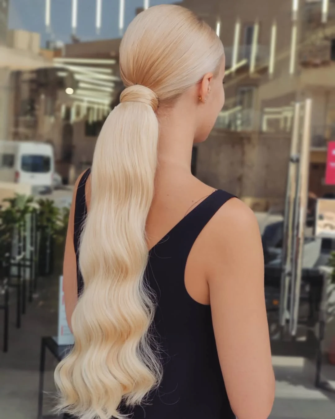 low summer ponytail hairstyle 2026 Sleek Platinum Low Ponytail with Soft Waves