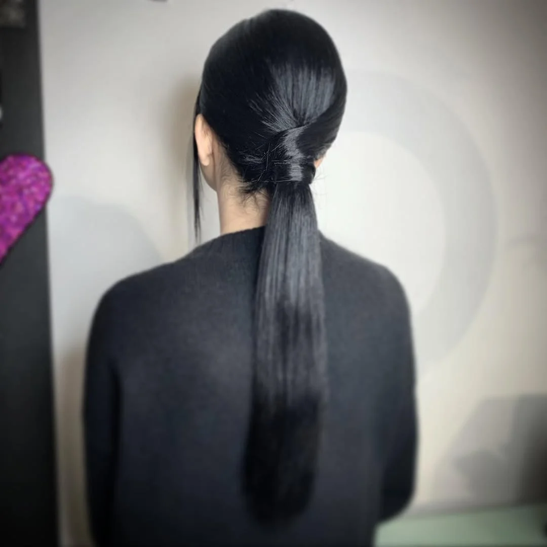 low summer ponytail hairstyle 2026 Glossy Black Low Ponytail with Sleek Control