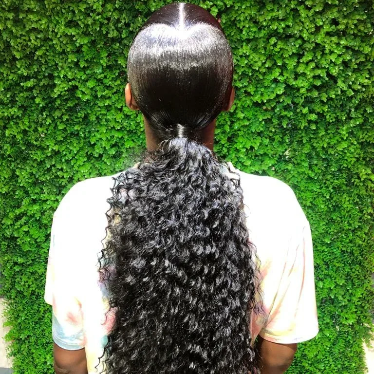 low summer ponytail hairstyle 2026 Sleek Curly Low Ponytail with High-Shine Contrast