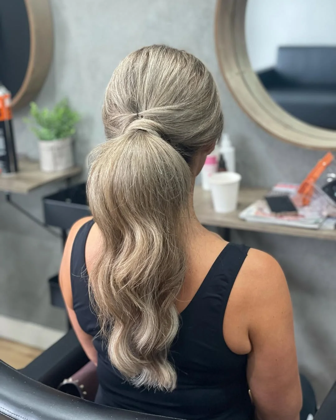 low summer ponytail hairstyle 2026 Silver Blonde Low Ponytail with Soft Natural Texture
