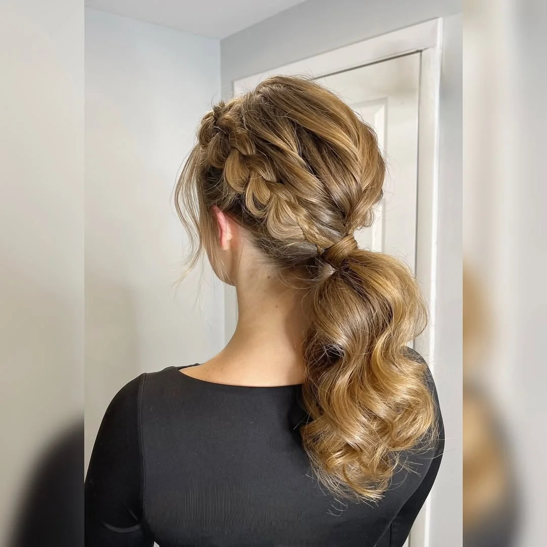 low summer ponytail hairstyle 2026 Braided Side Low Ponytail with Soft Blonde Volume