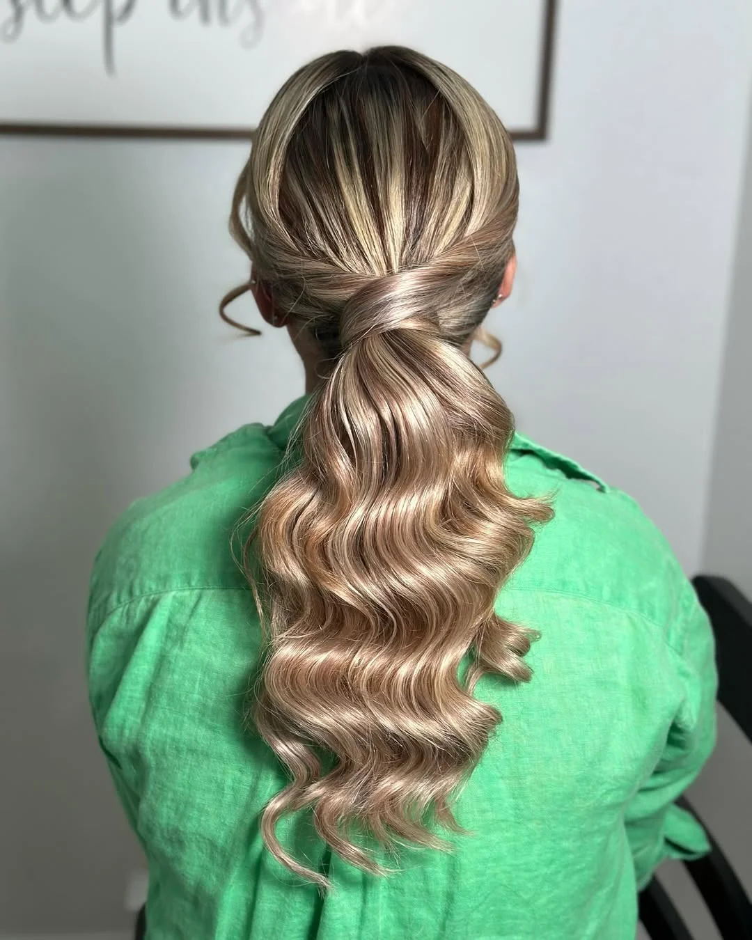 low summer ponytail hairstyle 2026 Champagne Blonde Low Ponytail with Polished Waves