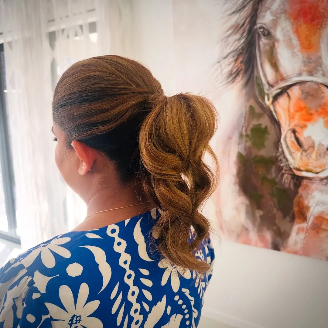 low summer ponytail hairstyle 2026 Side-Part Low Ponytail with Sculpted Bounce