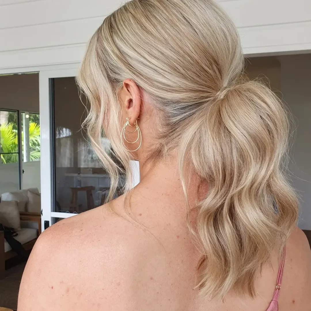 low summer ponytail hairstyle 2026 Low Blonde Ponytail with Soft Wavy Texture