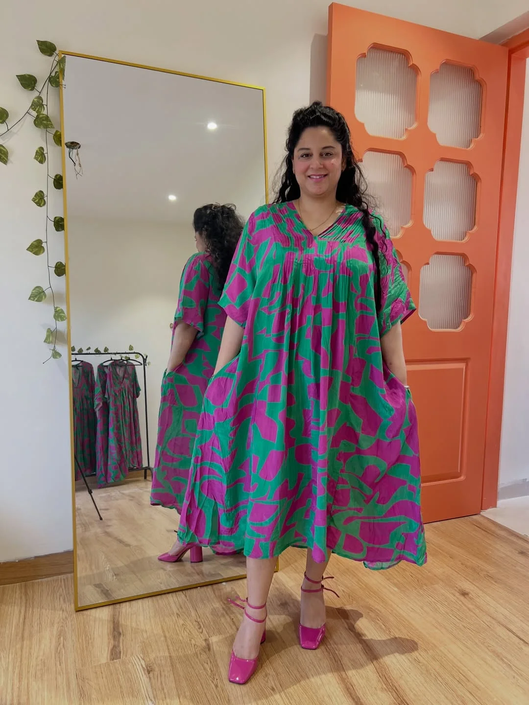 midsize outfits for women summer 2026 Bold Green And Pink Dress For A Summer Statement