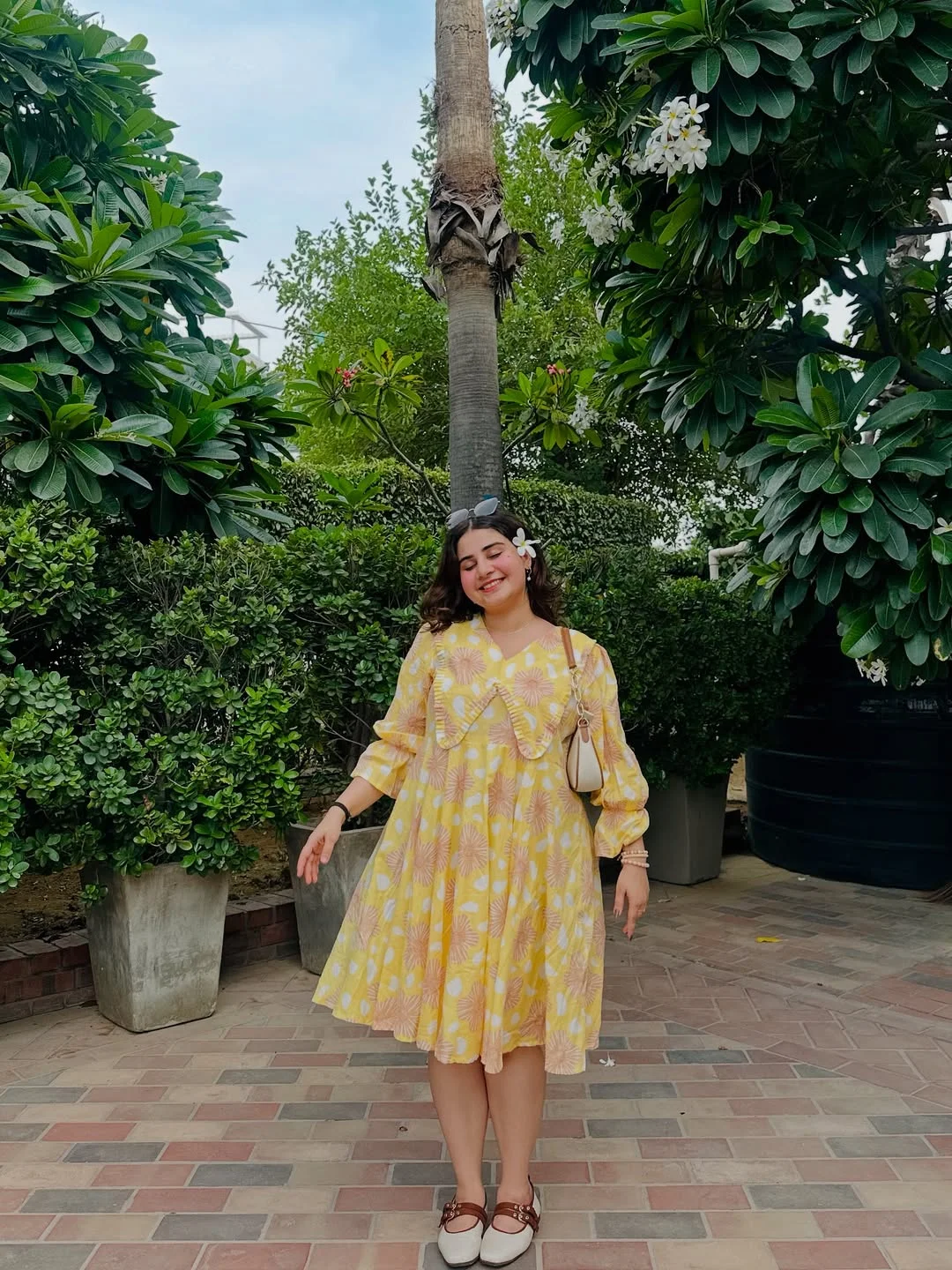 midsize outfits for women summer 2026 Yellow Floral Mini Dress For A Soft Vacation Glow
