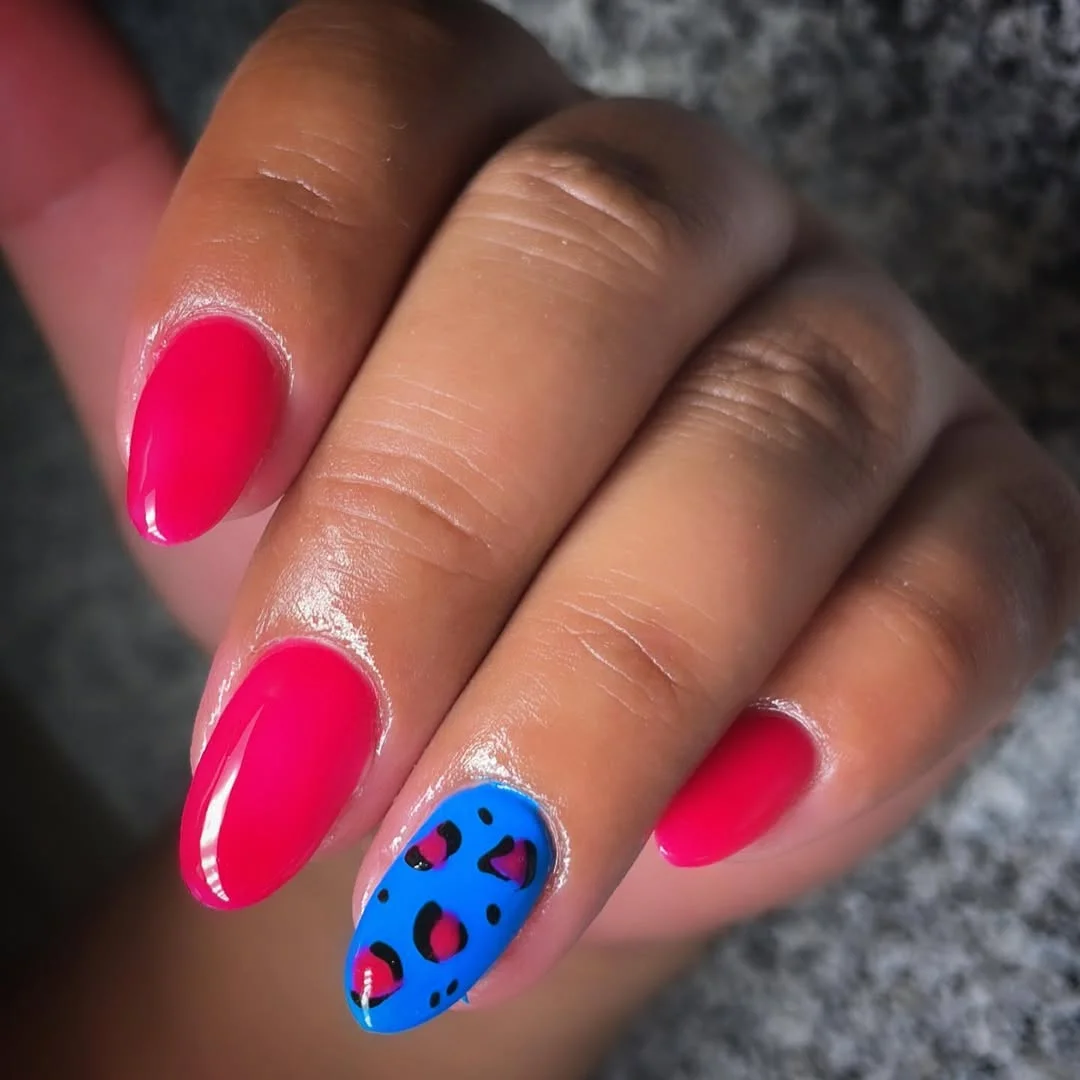 neon summer nails 2026 Short Neon Pink Nails with Blue Leopard Accent