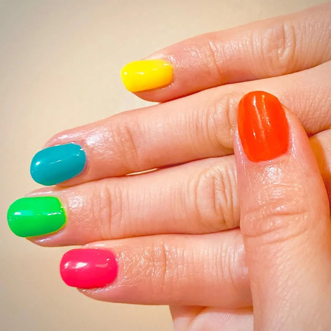 neon summer nails 2026 Rainbow Neon Almond Nails for a Simple Color Pop