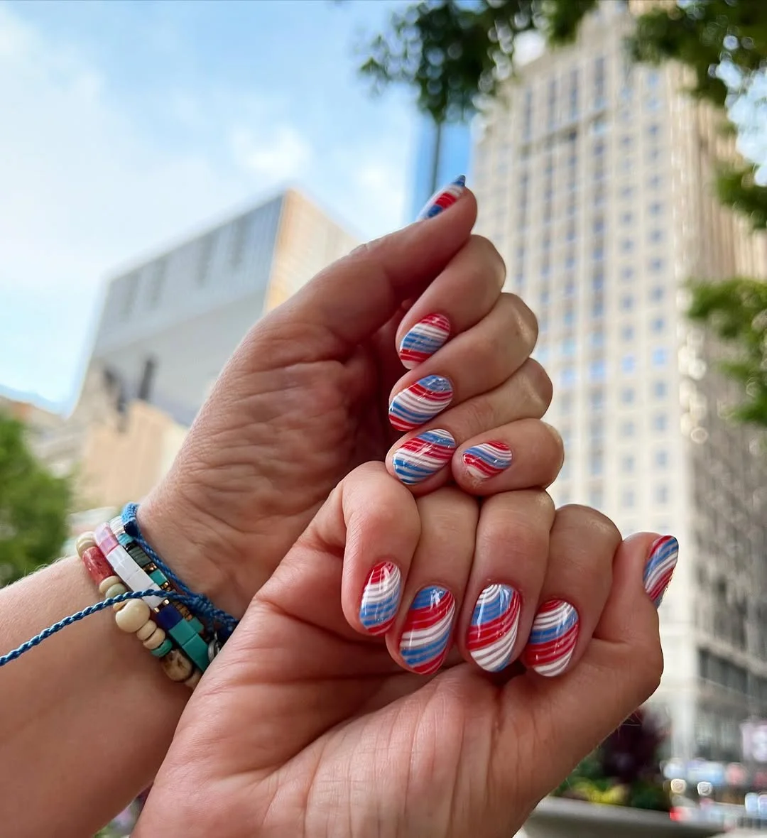 patriotic nails 2026 Swirled Red White and Blue City Nails