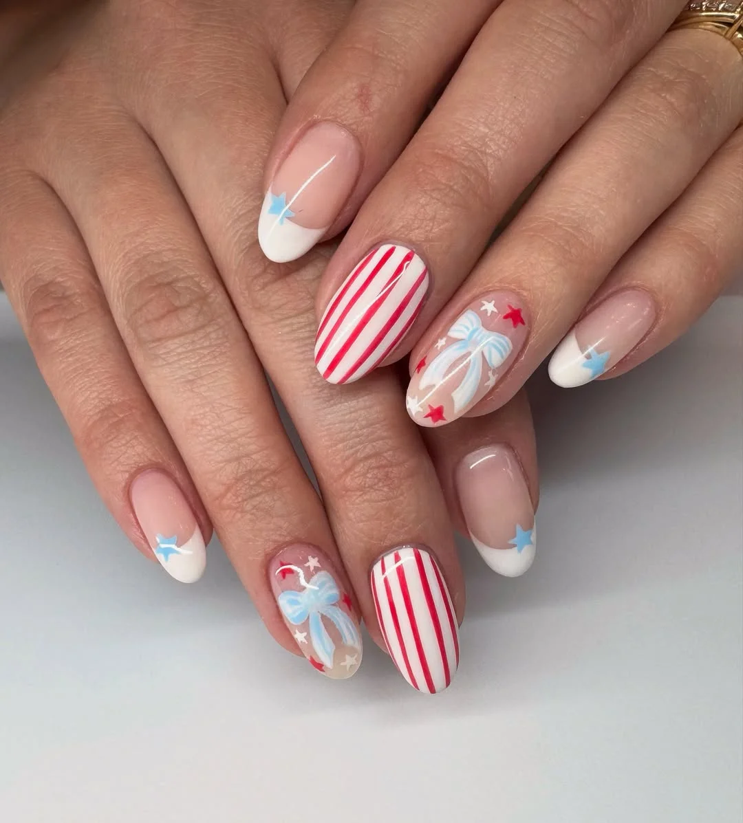 patriotic nails 2026 Soft French Tips With Red Stripes and Pale Blue Bows