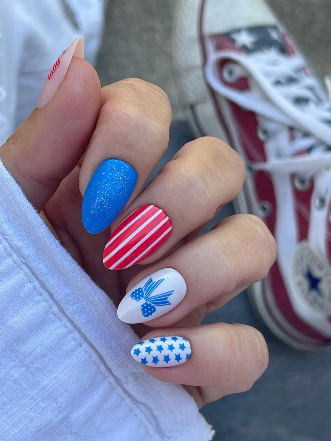 patriotic nails 2026 Blue Glitter Candy Stripes and Starry White Accents