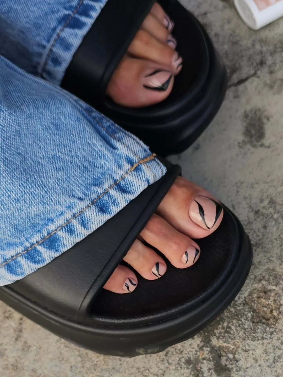 pedicure ideas - summer trends 2026 Minimal Black Leaf Pedicure On A Nude Base