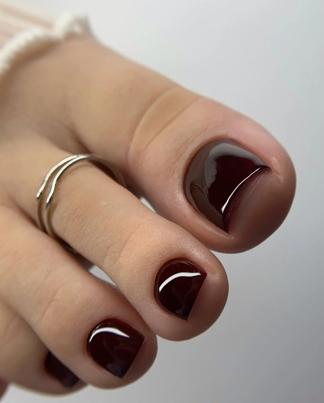 pedicure ideas - summer trends 2026 Glossy Cherry Brown Pedicure For Luxe Summer Evenings