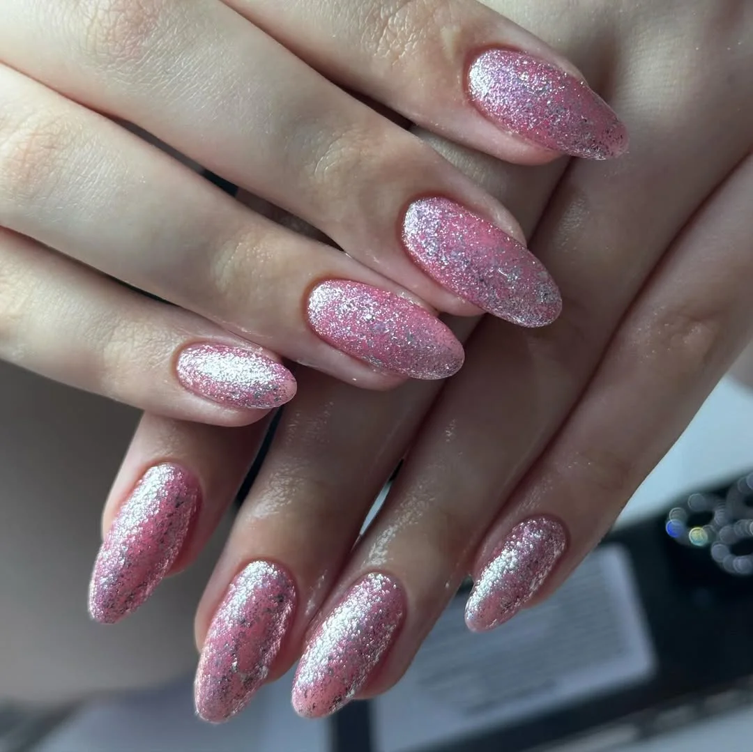 pink summer nails 2026 Sparkling Pink Almond Nails With A Glittered Summer Glow