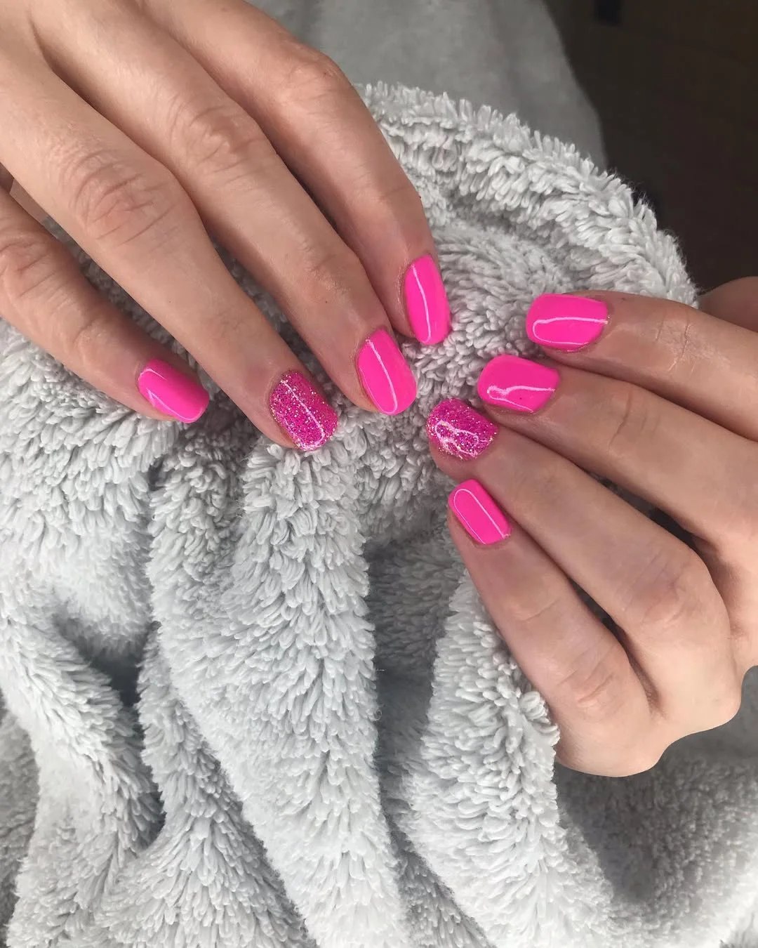 pink summer nails 2026 Bright Pink Square Nails With A Glitter Accent