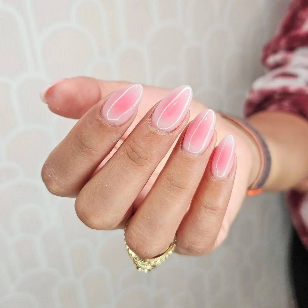 pink summer nails 2026 Milky Pink Almond Nails With A Barely-There Glow