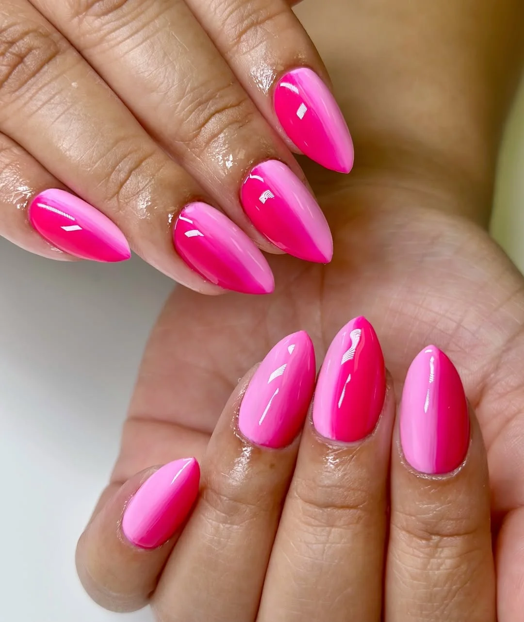 pink summer nails 2026 Two-Tone Pink Almond Nails With A Glossy Gradient Effect