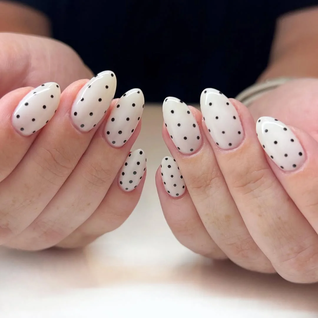 polka dot summer nails 2026 Soft White Almond Dots With A Clean Retro Finish