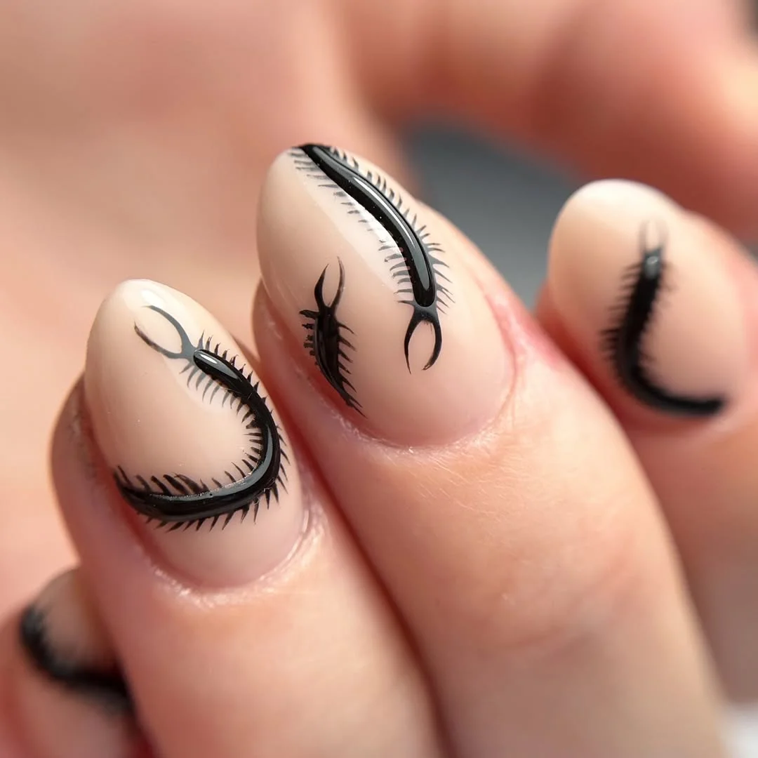 short gel nails summer 2026 Graphic Black Lash Art On Nude Short Almond Nails