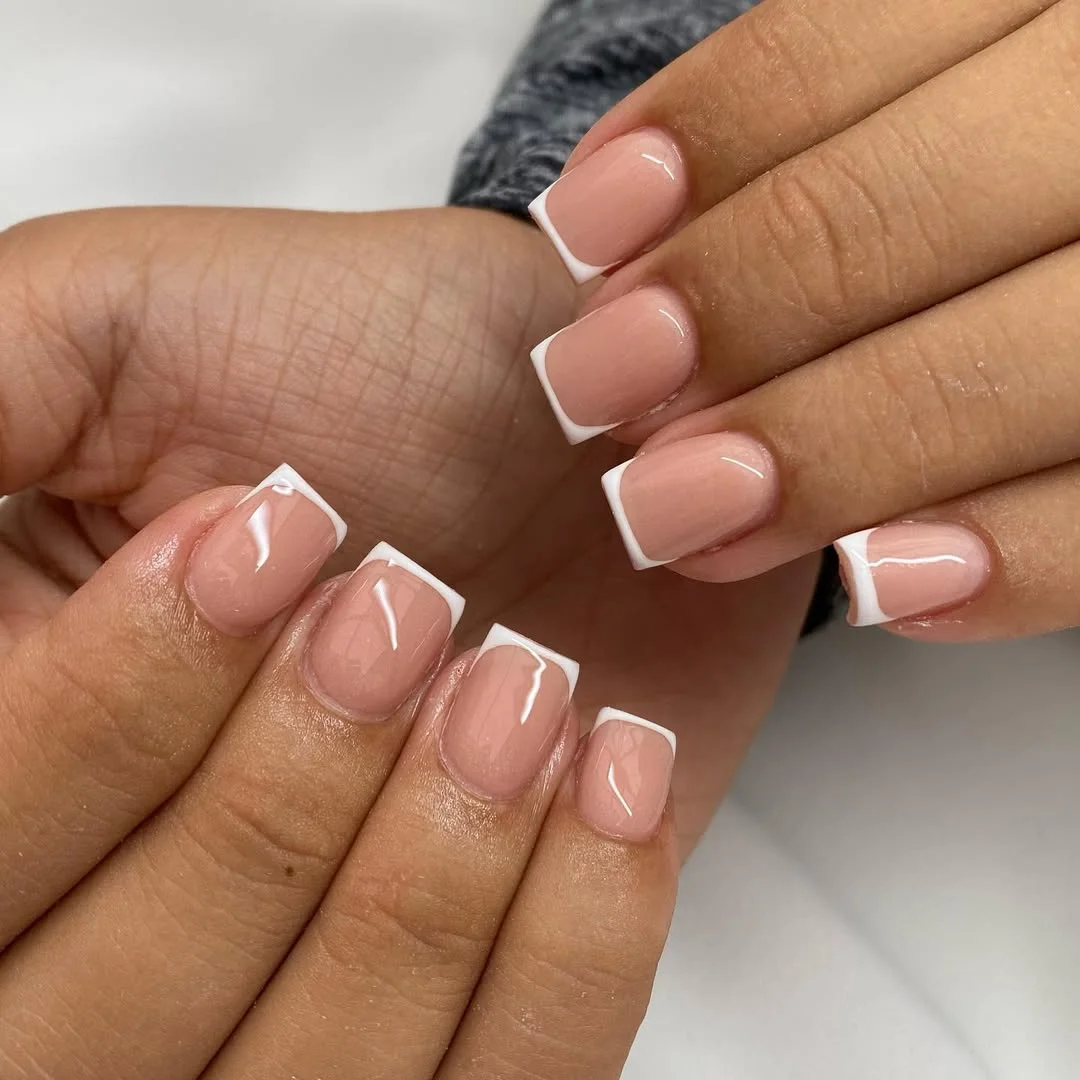 short gel nails summer 2026 Classic Soft Pink French Nails With A Short Square Shape