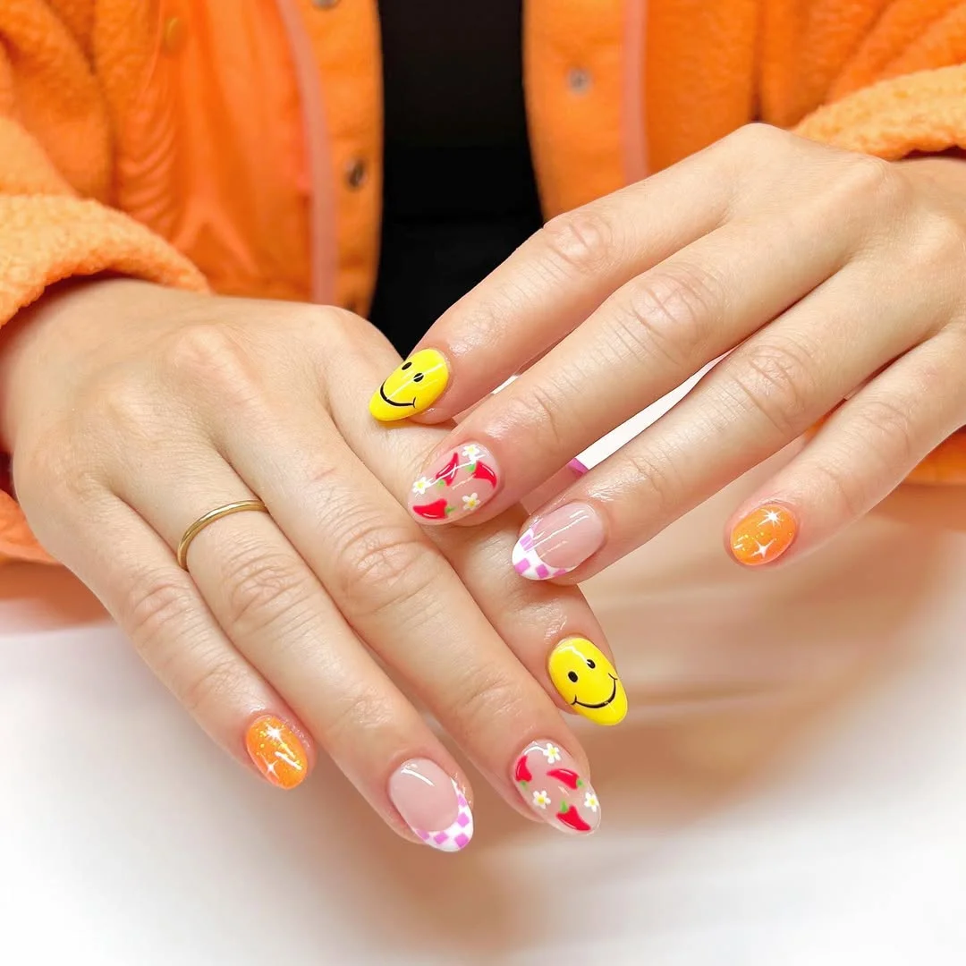 short gel nails summer 2026 Smiley Yellow And Orange Short Gel Nails With Mixed Summer Art