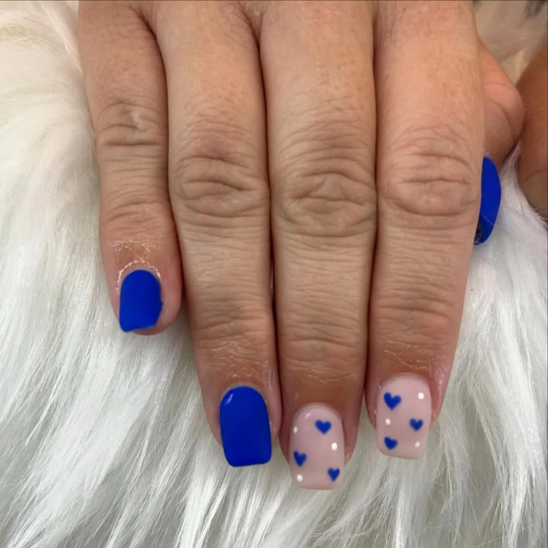 short squoval nails design 2026 Cute Blue Hearts on Nude Squoval Nails