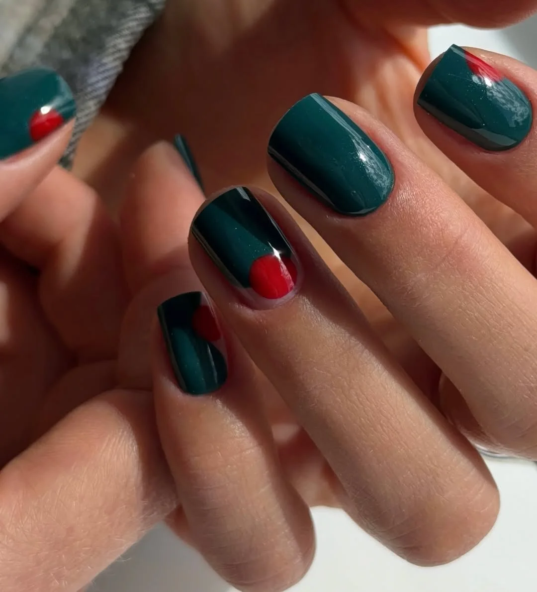 short squoval nails design 2026 Deep Green Squoval Nails with Red Dot Accents