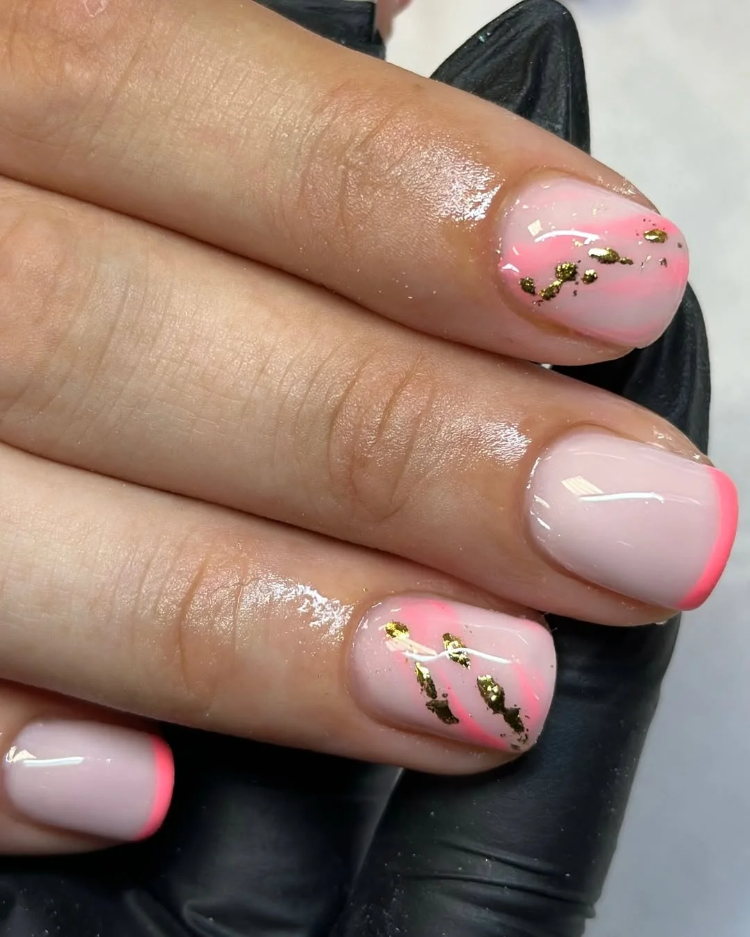 short squoval nails design 2026 Pink French Tips with Gold Flecks