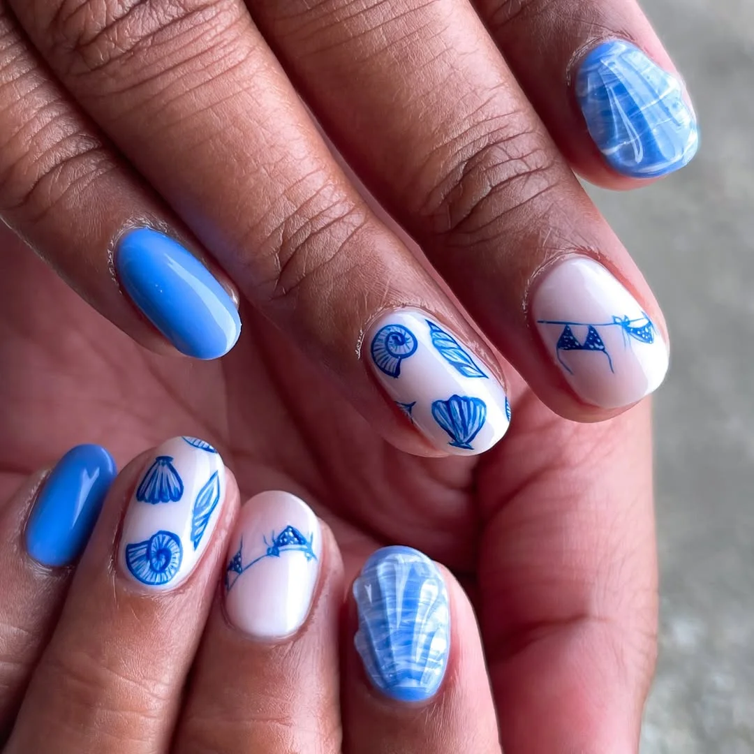 short summer nails 2026 Blue Seashell Art On Short Summer Nails