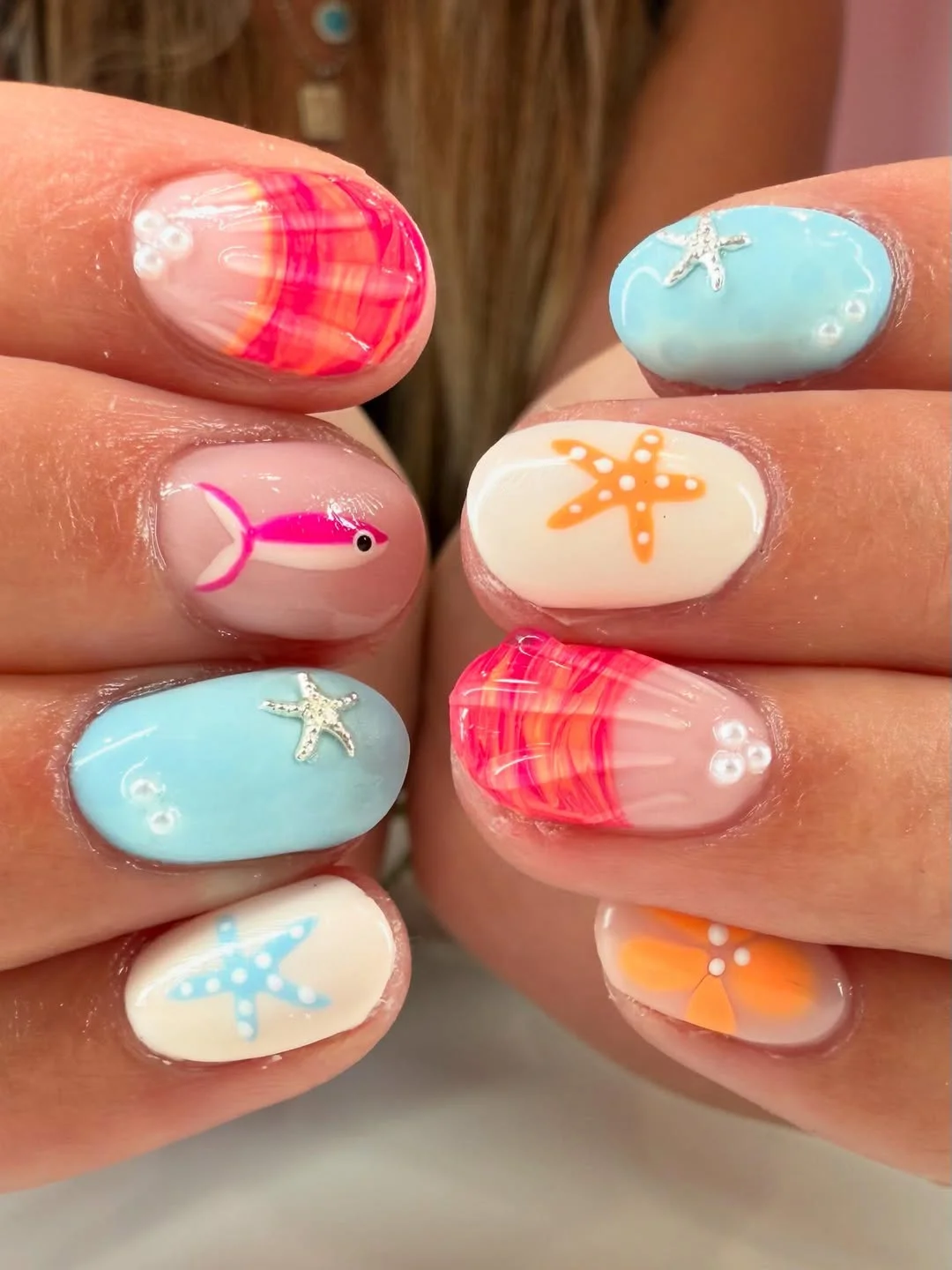short summer nails 2026 Beach Vacation Nails With Fish And Starfish Details