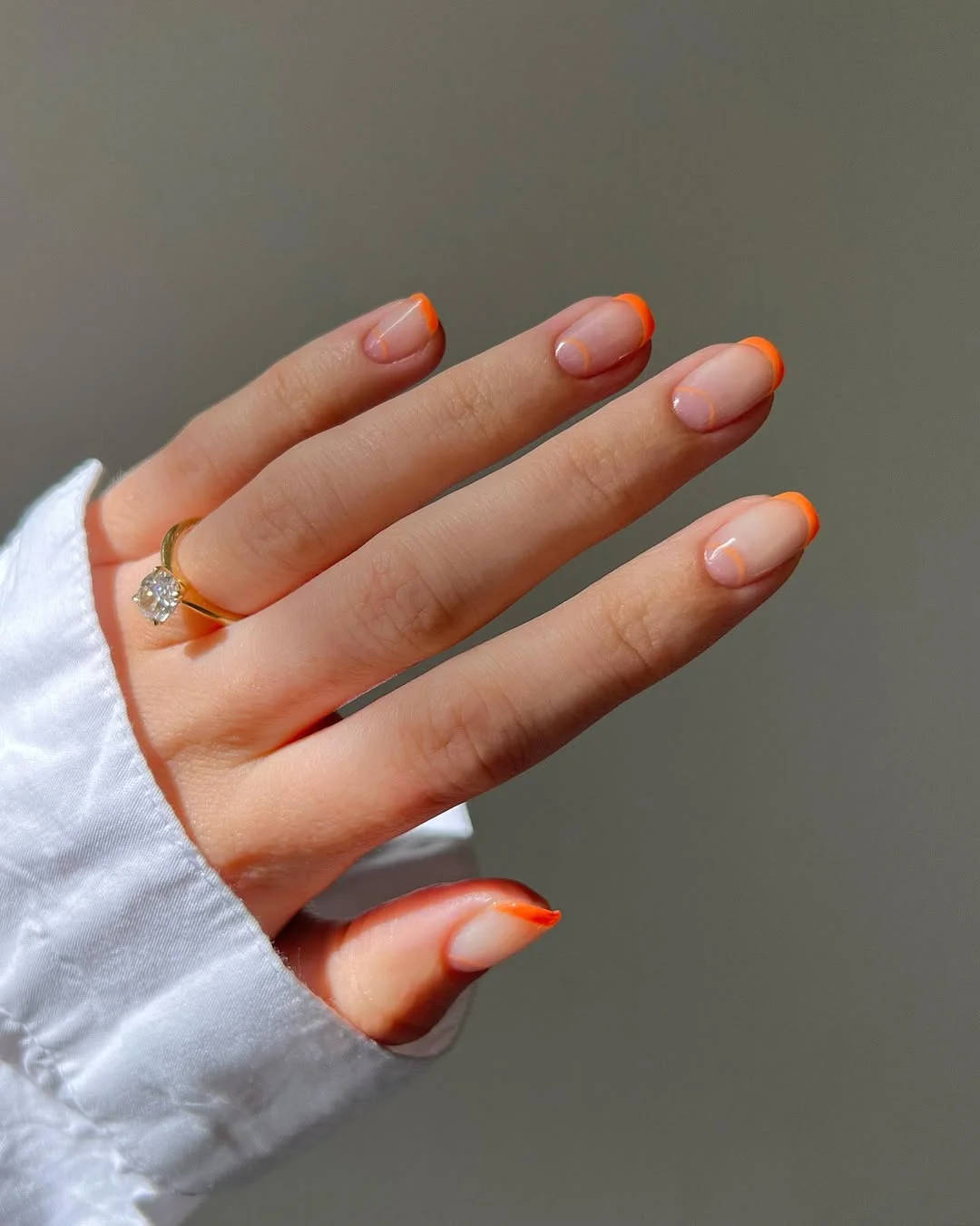 short summer nails 2026 Neon Orange French For Short Almond Nails