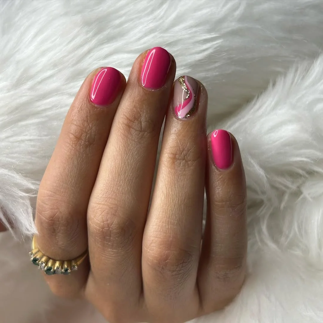short summer nails 2026 Glossy Raspberry Nails With A Gold Accent Wave