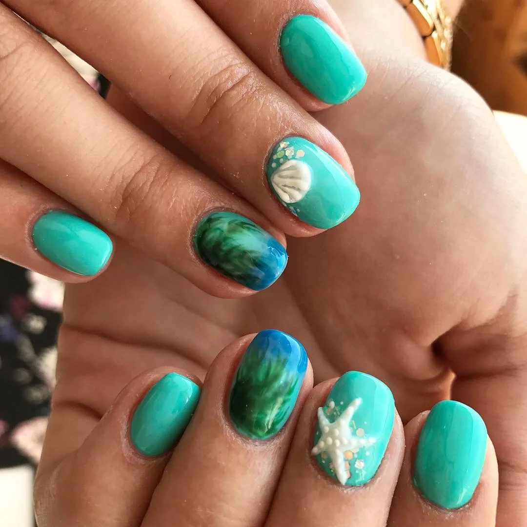 short summer nails 2026 Turquoise Ocean Nails With Shell Accents