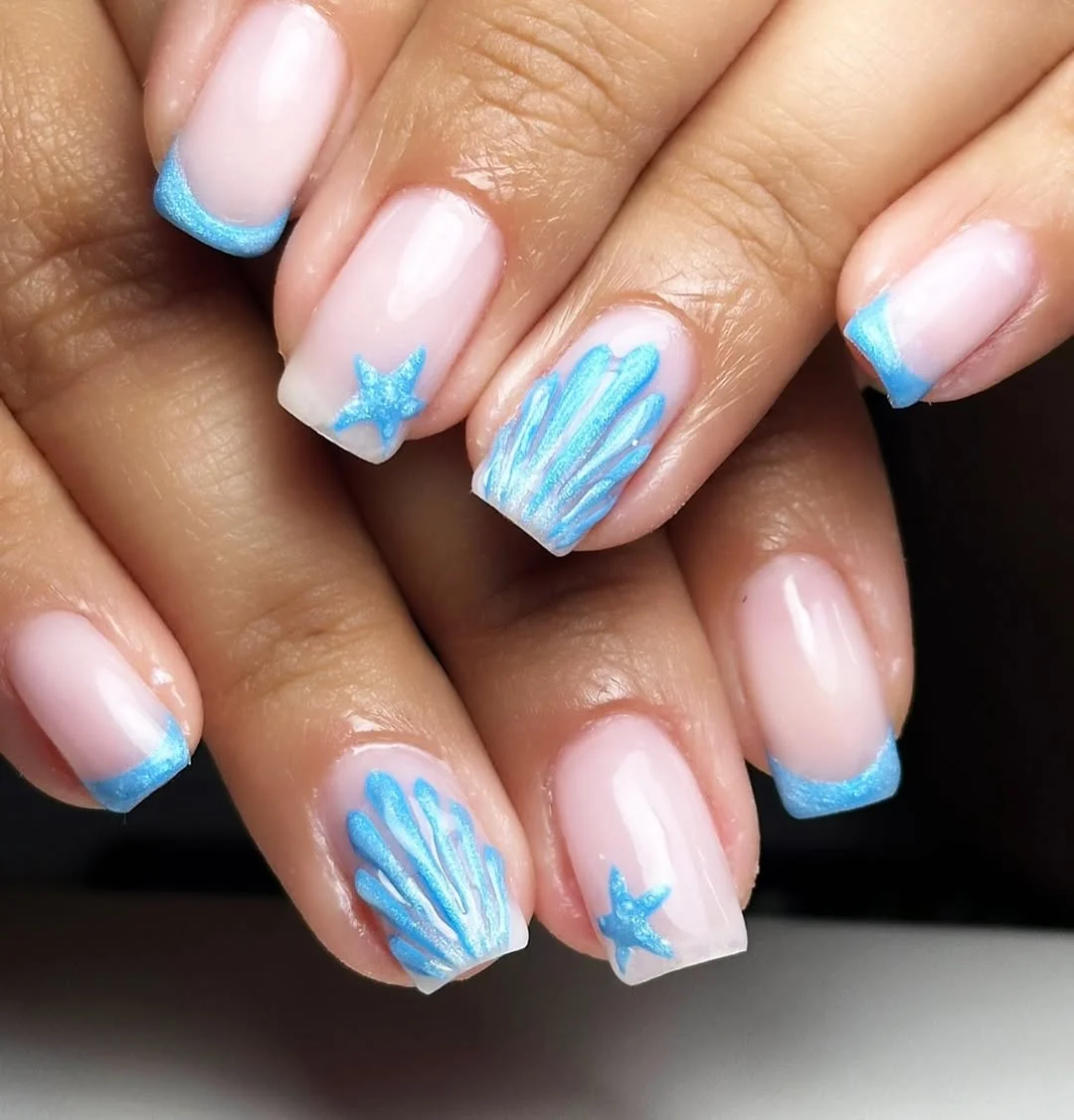 summer acrylic nails 2026 Sea Glass French Tips With Little Starfish Accents