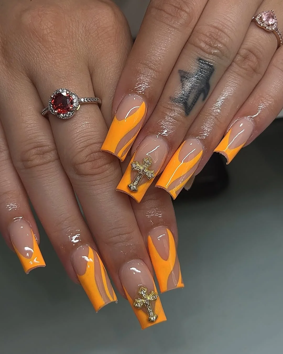 summer acrylic nails 2026 Orange Flame Square Nails With Gold Cross Charms
