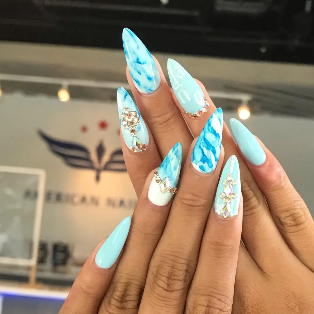 summer acrylic nails 2026 Aqua Marble Stiletto Nails With Crystal Summer Details