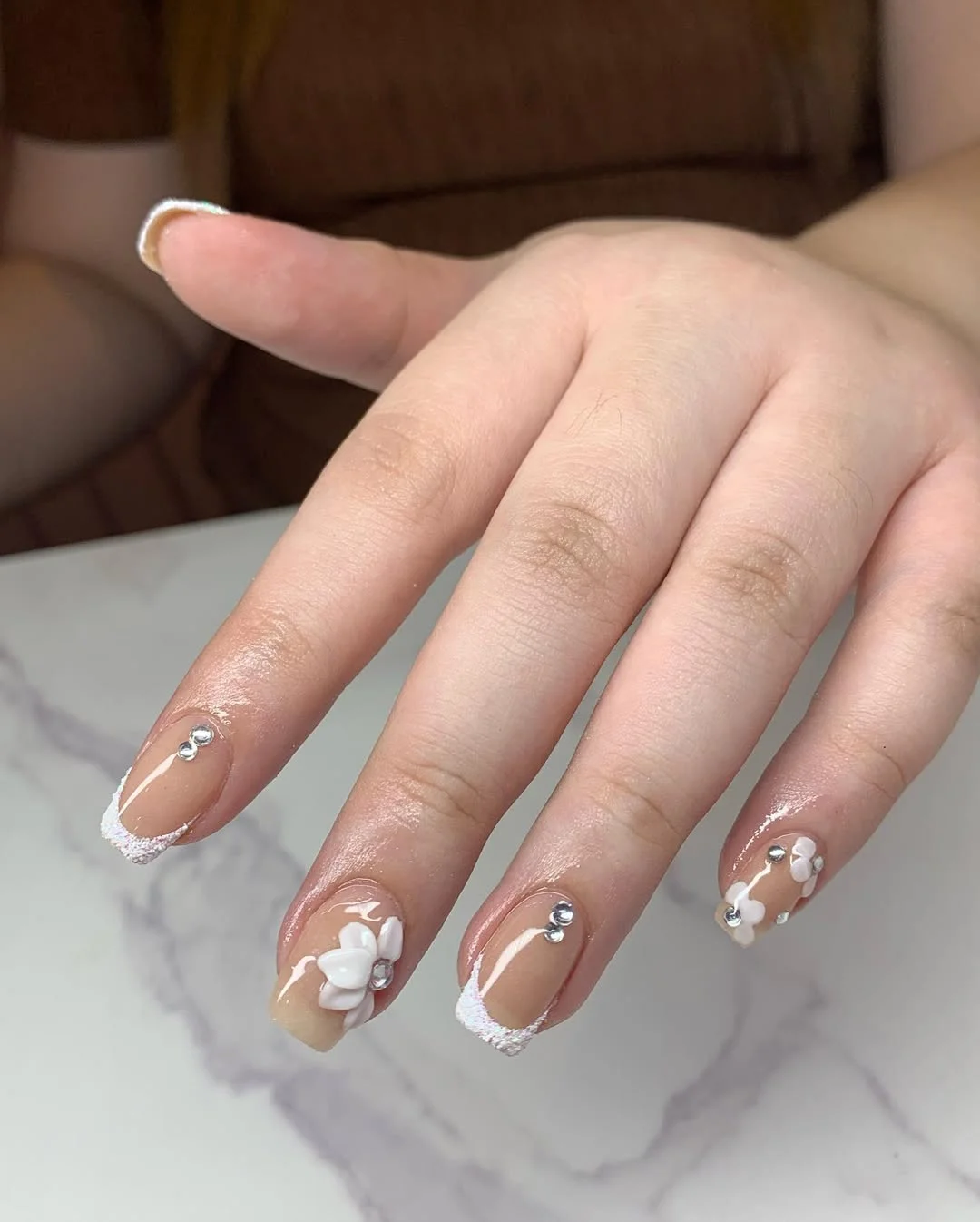 summer acrylic nails 2026 Soft Nude French Tips With White 3D Florals