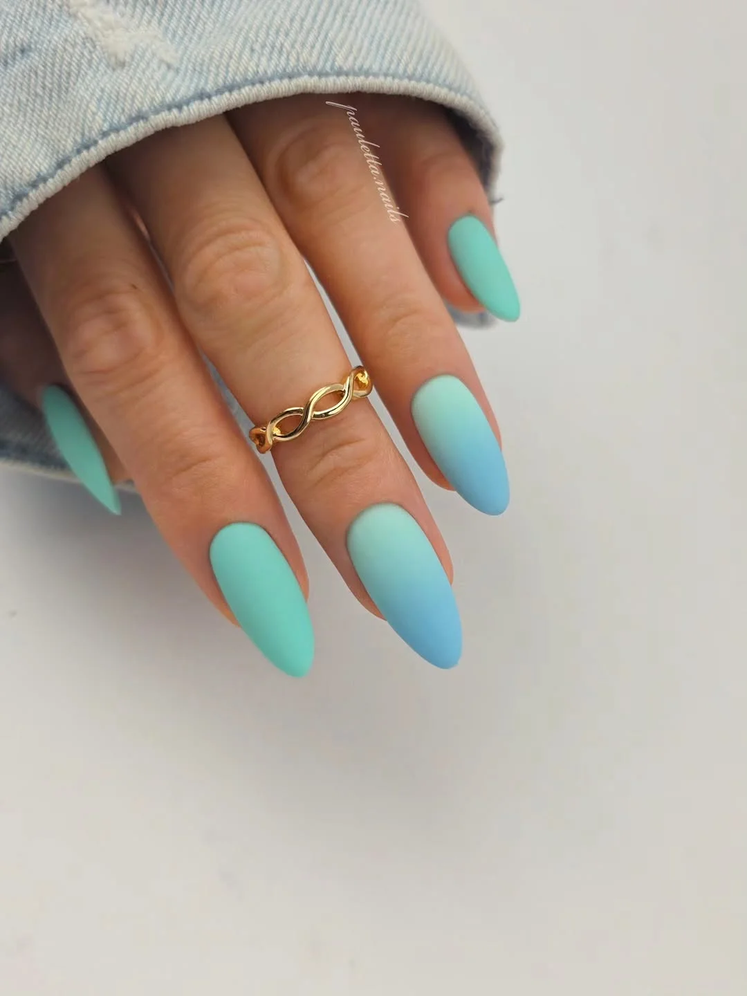 summer beach nails 2026 Soft Aqua Almond Nails With a Beachy Gradient