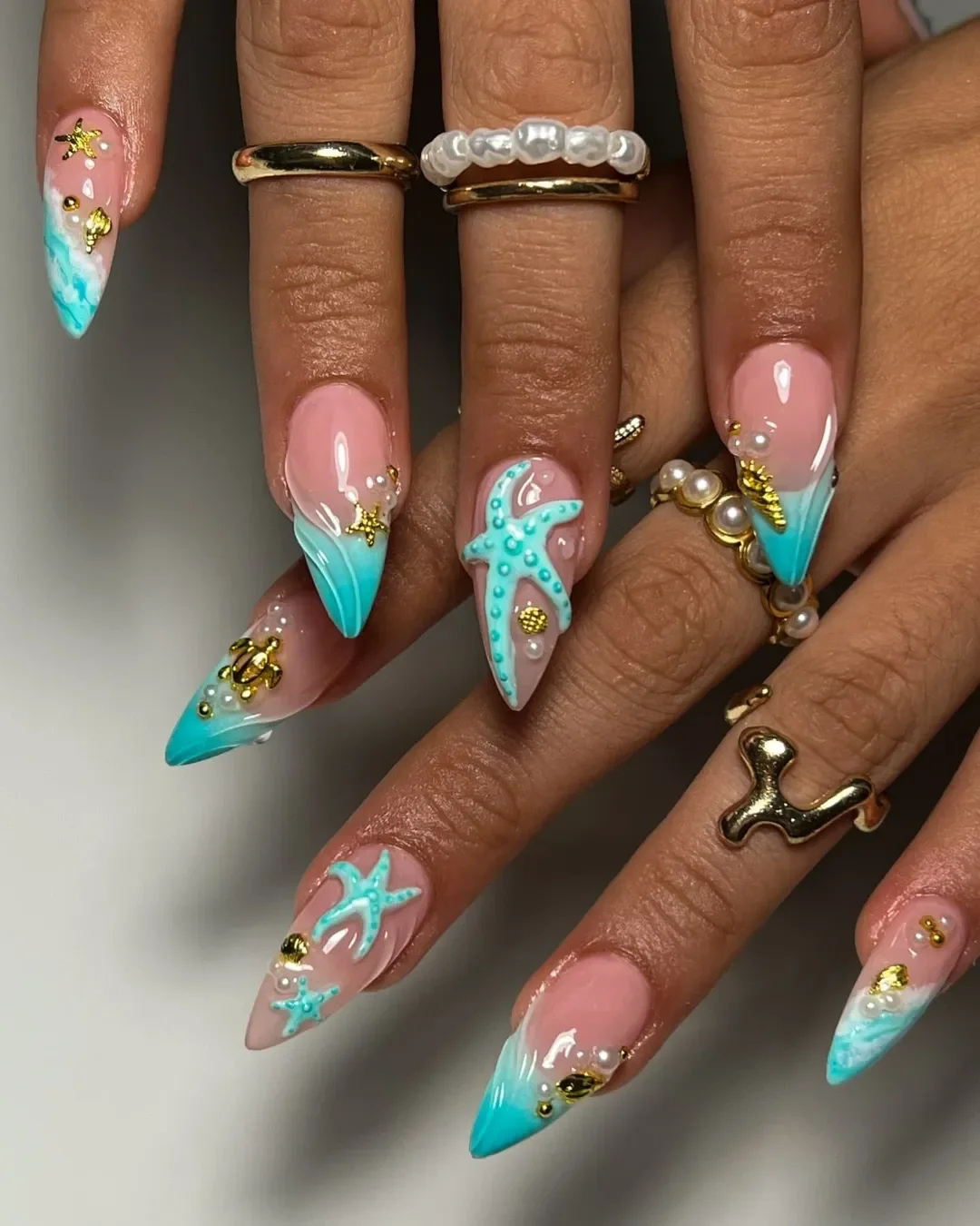 summer beach nails 2026 Turquoise 3D Ocean Nails With Pearls and Gold Charms