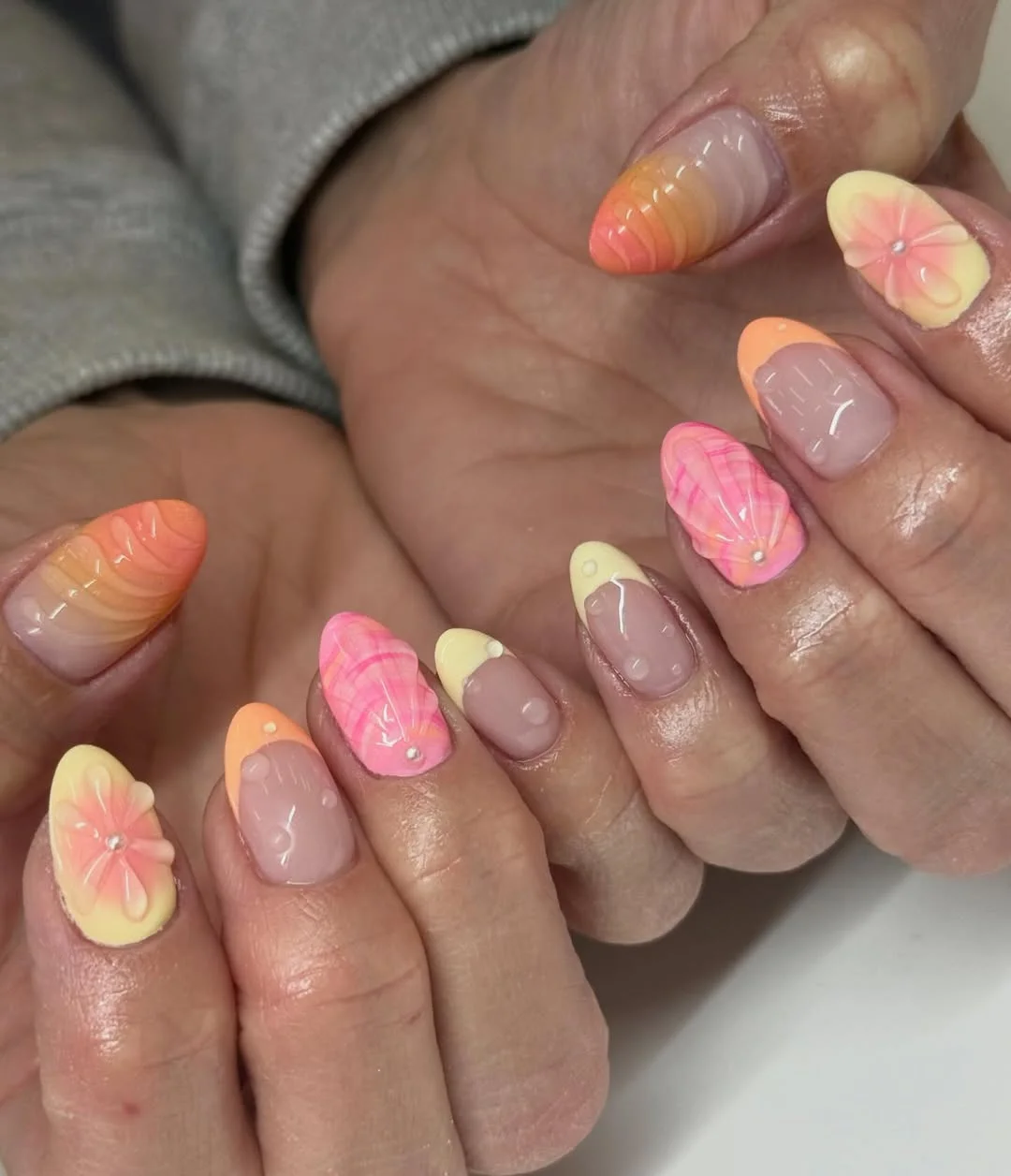 summer beach nails 2026 Coral Pink Shell Nails With Soft Sunset Tips