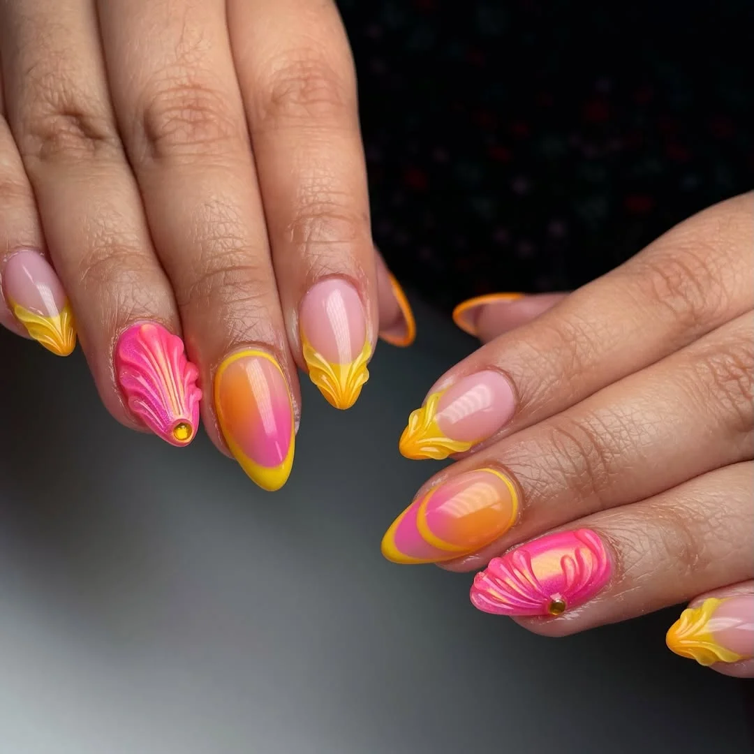 summer beach nails 2026 Pink and Orange Shell French Nails With a Bright Tropical Edge