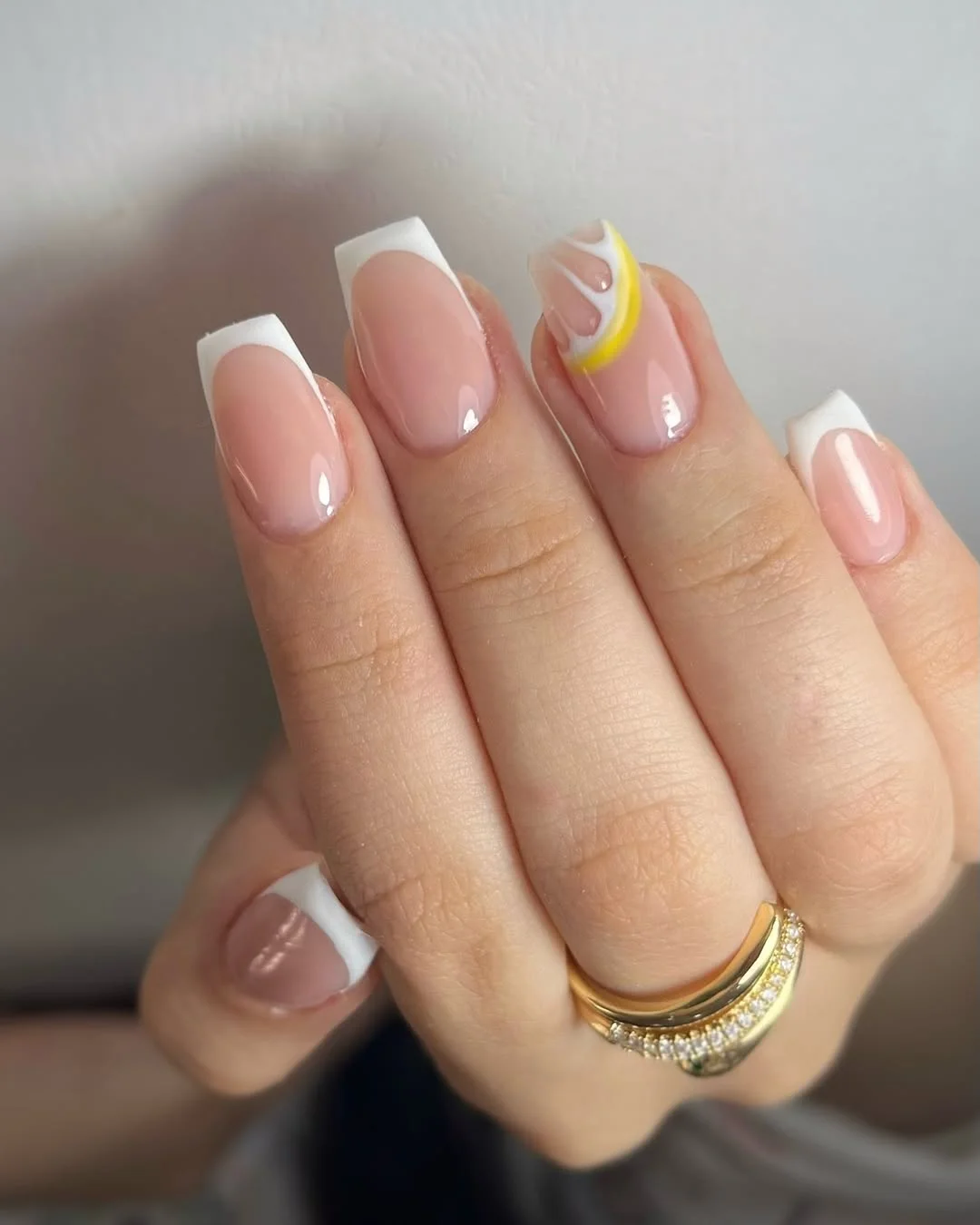 summer beach nails 2026 Glossy White French Nails With a Lemon Wave Accent
