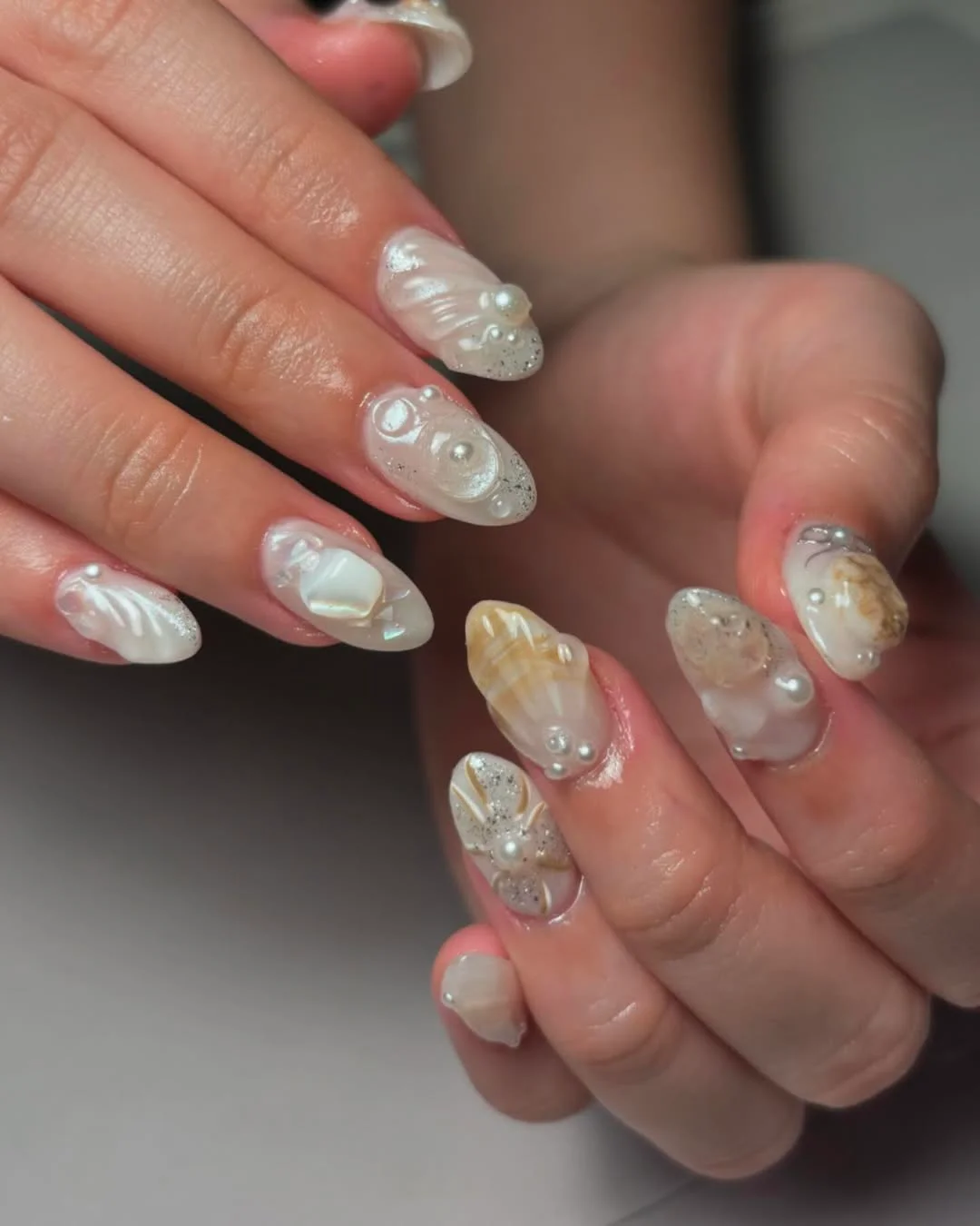 summer beach nails 2026 Neutral 3D Seashell Nails With Pearls and Sand Glitter