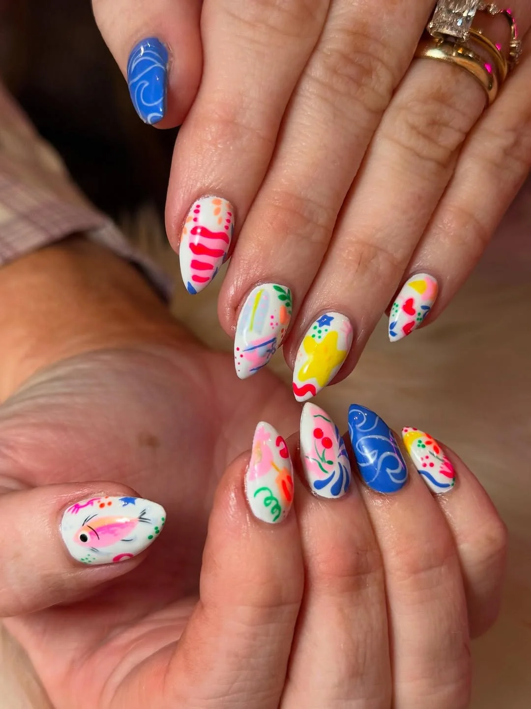 summer beach nails 2026 Colorful Vacation Doodle Nails With a Playful Beach Spirit
