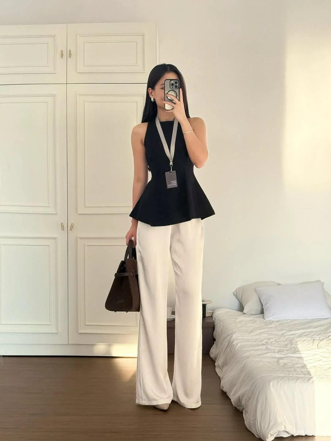 summer business casual outfit for women 2026 Black Peplum Top With White Wide-Leg Pants