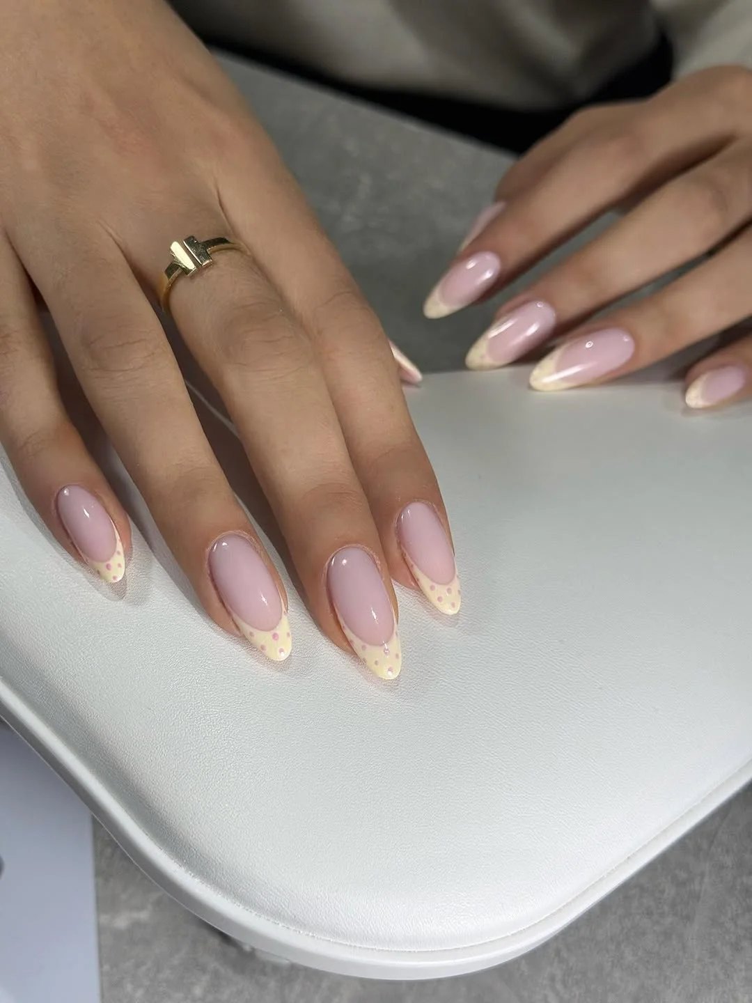 summer dip nails 2026 Milky Pink Almond French With Soft Yellow Dots