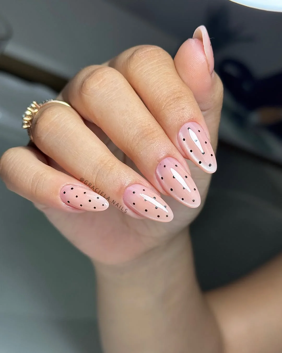 summer dip nails 2026 Blush Almond Nails With Minimal Black Polka Dots